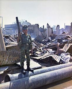 Child soldier in Vietnam War at United Nations Security Council Resolution 1379, by the United States Army Signal Corps (edited by MickStephenson)