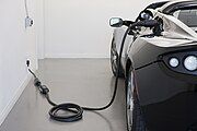 Tesla Roadster charging indoors