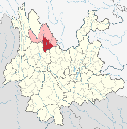 Location of Yongsheng County (red) and Lijiang City (pink) within Yunnan