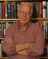 A photograph of an older man smiling