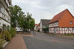 Village green (left) and the oldest timber house in the region (right)