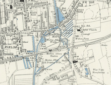 Map of Merton Abbey area with buildings shown, and waterways in blue.