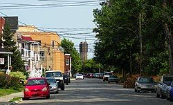 Rue Curatteau. In background, a ventilation tower for Louis-Hippolyte-La Fontaine tunnel