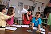 Children learning about sound in a science lesson