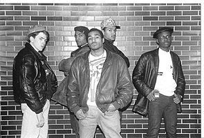 Four-man Hip Hop Group photo shoot, brick wall background