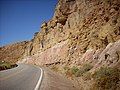 Poleo Formation (tan sandstone beds at top) resting on Salitral and Shinarump Formations. West of Abiquiu, New Mexico.