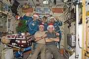 Crewmembers celebrating Christmas in Zvezda