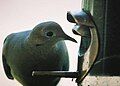 Mourning Doves at a thistle feeder.