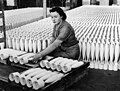 Stacking practice bombs in a factory, 1943