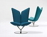 Angel designed by Busk Hertzog in 2011 - a lounge chair on a swivel base.