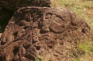 Makemake with two birdmen, carved from red scoria