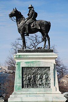 A brown bronze statue of Ulysses S. Grant on horseback. The statue sits atop a marble pedestal. For more detailed information, see the article on the work.