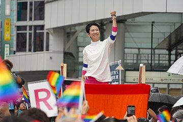 Renhō giving a speech in front of Shinjuku Station.