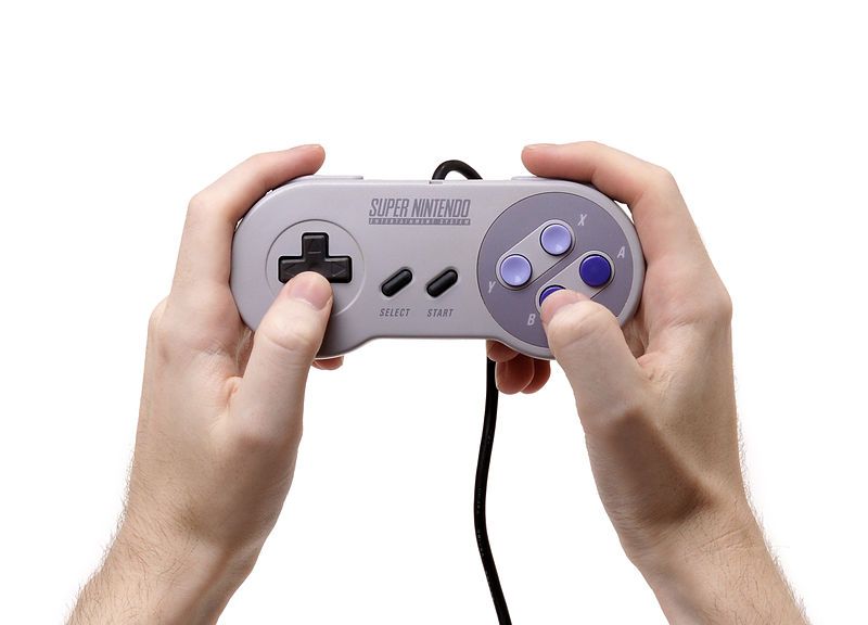 File:SNES-Controller-in-Hand.jpg