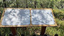 A sign with information at the Vavatsinia Beehive trail.