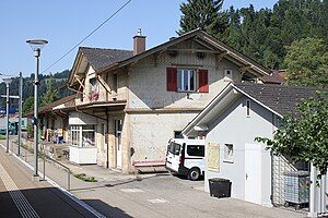 Two-story building with gabled roof