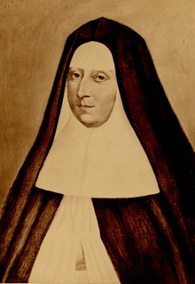 Portrait of a white Christian nun in habit and wimple