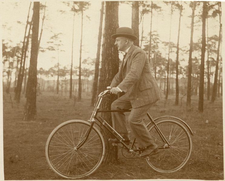 File:Man on bicycle.jpg