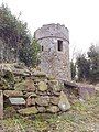 Cruagh watchtower with the remains of the church on the left