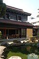 Townhouse with black (edoguro) colouring to upper floor