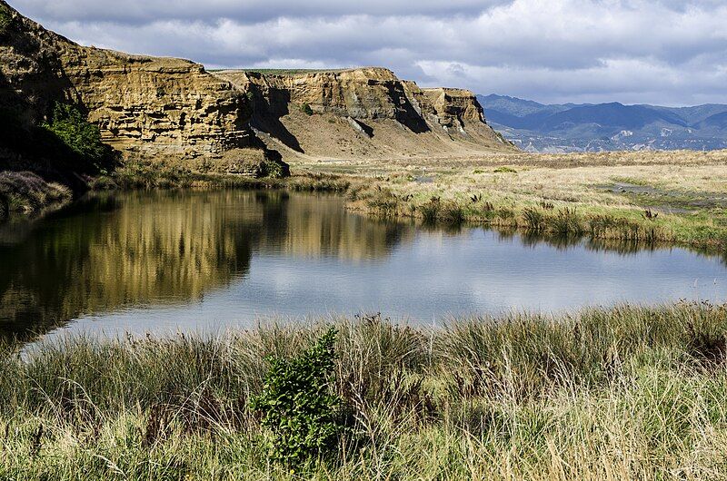 File:Lake Ferry Cliffs.jpg