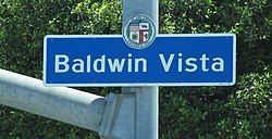 Baldwin Vista neighborhood sign located at the southwest corner of La Brea Avenue and Coliseum Street