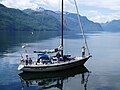 A sailboat explores Princess Royal Reach of the lekw’emin.