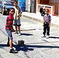 Image 10Plaquita, a Dominican street version of cricket. The Dominican Republic was first introduced to cricket through mid-18th century British contact, but switched to baseball after the 1916 American occupation. (from Culture of the Caribbean)