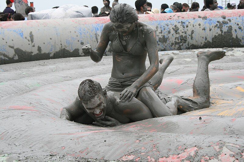 File:Mud wrestling couple.jpg