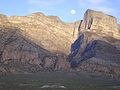 Notch Peak with the moon in the notch, at sunset