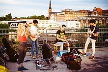 Alice Phoebe Lou performing with her band at Warschauer Straße Station, Berlin in 2016