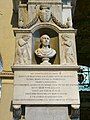 Monument of Paolo M. Martinez, benefactor (on external left pillar), whose tomb is in the chapel pavement