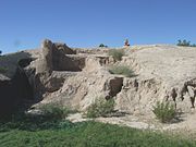 The Temple Mound. Built by the Hohokam in 1100 AD. The walls are made of “caliche”, the calcium carbonate hardpan that forms under the desert soils. The mound is longer and wider than a modern football field (note: U.S. Football) and is 27 feet high.