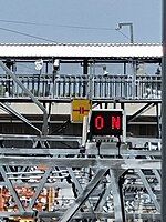 8P motto board that appears at the Lebak Bulus MRT Depot exit access