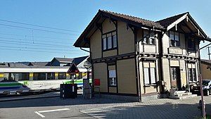 Two-story building with gabled roof