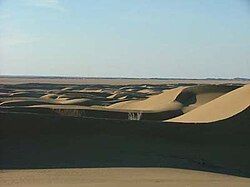 A view of the sand dunes in the center of Rig-e Jen