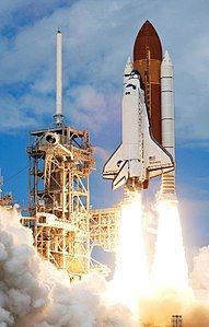 Space Shuttle Discovery launch, by NASA (edited by John O'Neill)