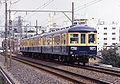 A 3450 series train in blue and yellow livery in August 1983