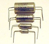 Axial style tantalum electrolytic capacitors