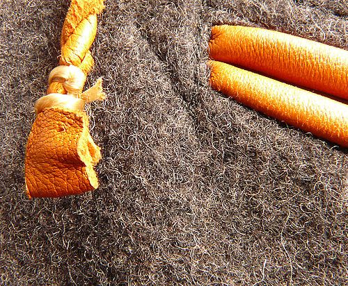 Close-up of broadcloth surface, with corner of pocket and end of drawstring for scale, photographed at 6× magnification