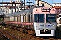 Salmon pink liveried set 1710 in December 2022