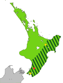 Map of the North Island of New Zealand coloured light green with dark green stripes from the central mountains to the sea along the east coast to Wellington, and one red and two yellow dots.