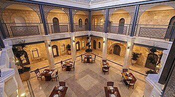 The Spanish-style patio (courtyard)[1] of the Sephardic House (the hotel run by the Sephardic Educational Center)