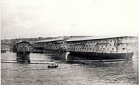 Photograph of Eylau as a hulk in Toulon (foreground)