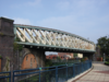 The longer east side of the Braunstone Gate Bridge in 2008 showing the River Soar passing under both the railway and Western Boulevard