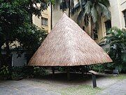 A model of an Ifugao house in the courtyard of the building.