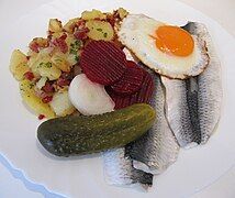 Cuisine of Hamburg – Traditional and simple lunch in Hamburg: Bismarckhering, Bratkartoffeln, and Spiegelei