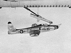 A Republic F-84E on FICON trapeze