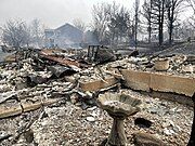 Front porch of a home burned by the fire.