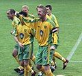 Picture of footballer Iwan Roberts, with a number of other players visible in the background